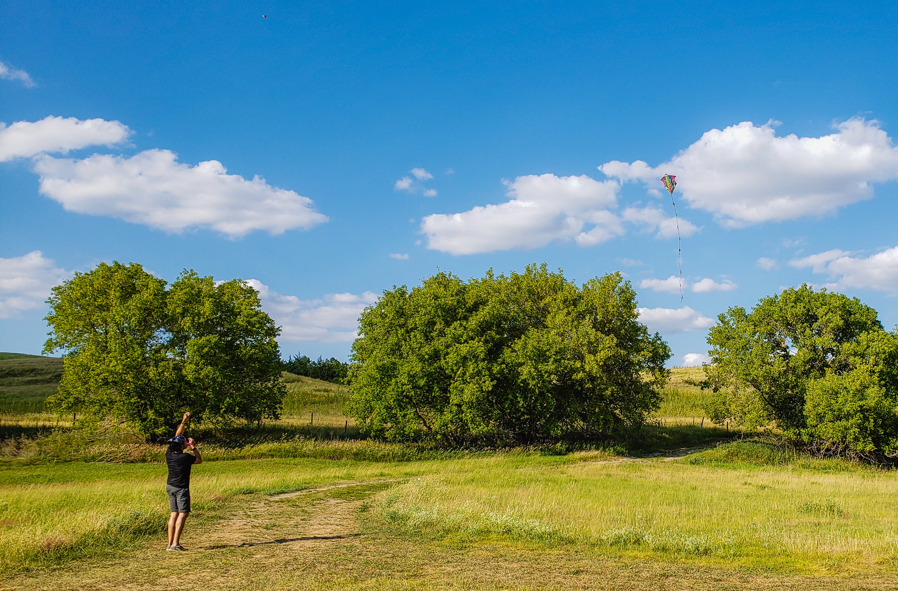 Man flying a kite.